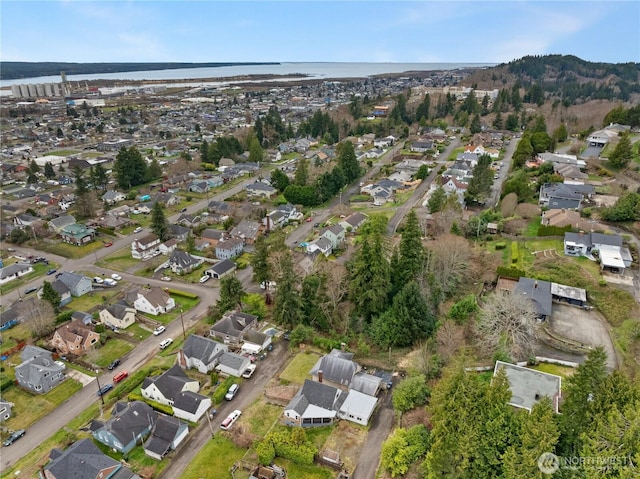 birds eye view of property with a residential view