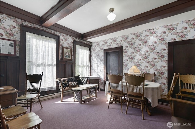 interior space with beam ceiling and wallpapered walls