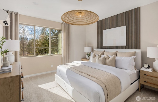 carpeted bedroom with an AC wall unit and baseboards