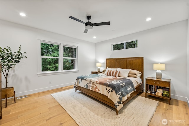 bedroom featuring recessed lighting, visible vents, baseboards, and light wood-style floors