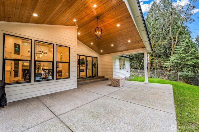 view of patio featuring fence