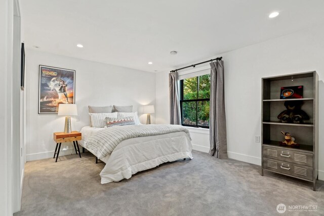 carpeted bedroom featuring recessed lighting and baseboards