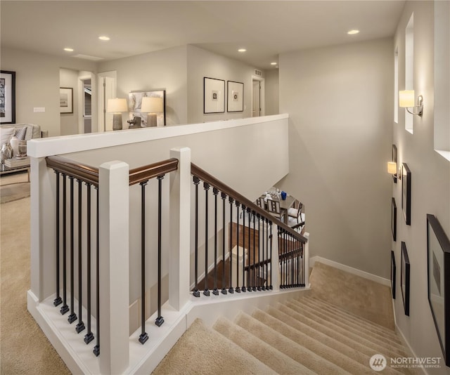 stairs featuring carpet flooring, recessed lighting, and baseboards