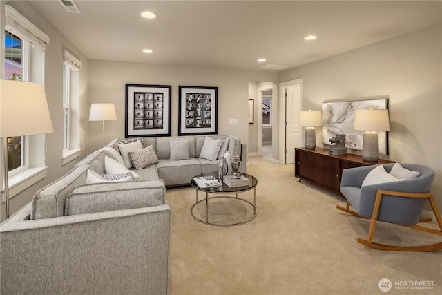 living area with recessed lighting and carpet flooring