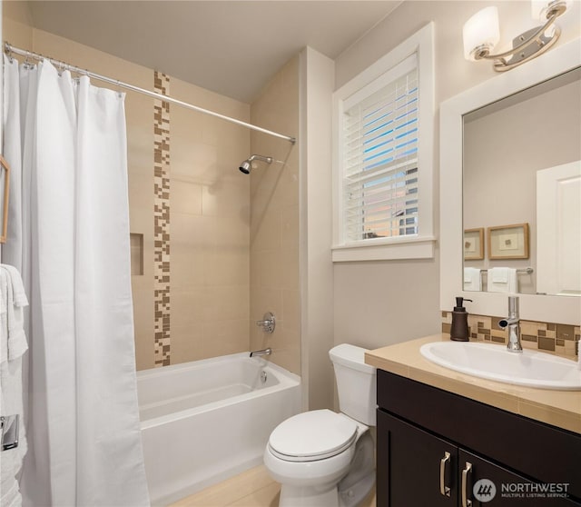 full bathroom with vanity, tasteful backsplash, toilet, and shower / bath combination with curtain