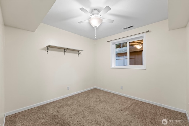 unfurnished room with visible vents, ceiling fan, baseboards, and carpet floors