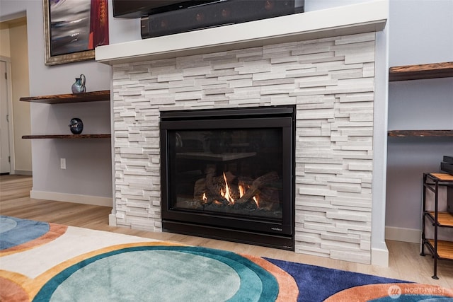 30 Sundae Dr, Sequim, WA 98382 - details with baseboards, wood finished floors, and a fireplace