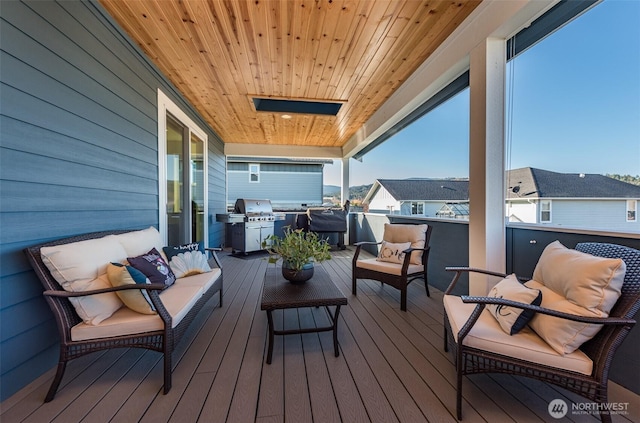 30 Sundae Dr, Sequim, WA 98382 - wooden terrace with a grill and outdoor lounge area