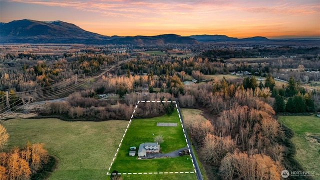 aerial view at dusk with a mountain view