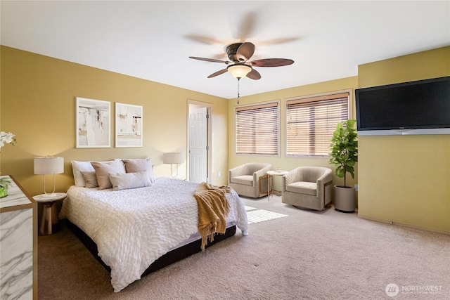 carpeted bedroom with a ceiling fan