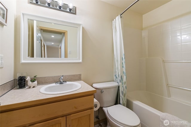 full bathroom with vanity, toilet, and shower / bath combo