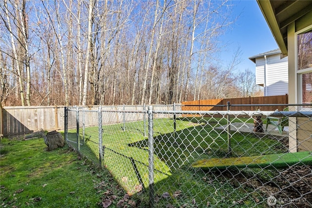 view of yard featuring a fenced backyard