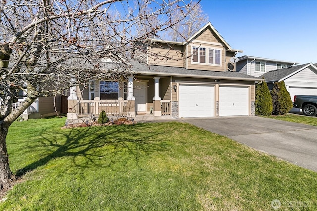 craftsman house with driveway, stone siding, covered porch, a front yard, and an attached garage