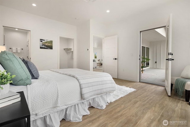 bedroom featuring recessed lighting, baseboards, and light wood-style floors