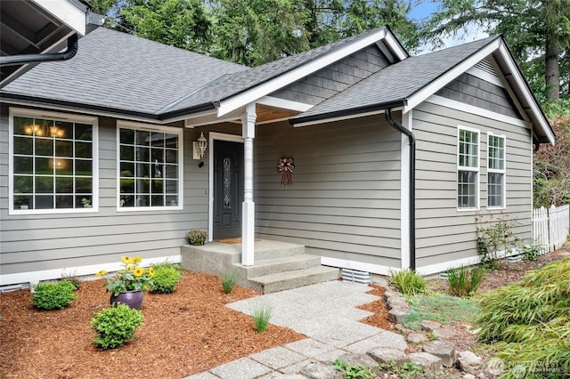 view of front of home featuring a shingled roof