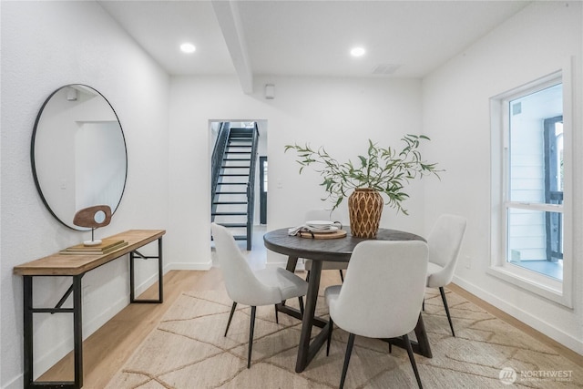 dining area with recessed lighting, light wood-type flooring, and baseboards