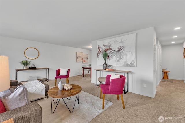 living room with light carpet, recessed lighting, and baseboards