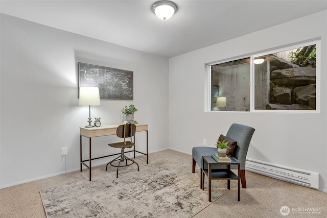 carpeted home office with baseboards and baseboard heating