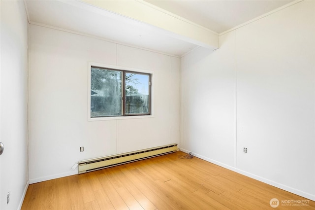 unfurnished room with light wood finished floors, baseboard heating, baseboards, and beam ceiling