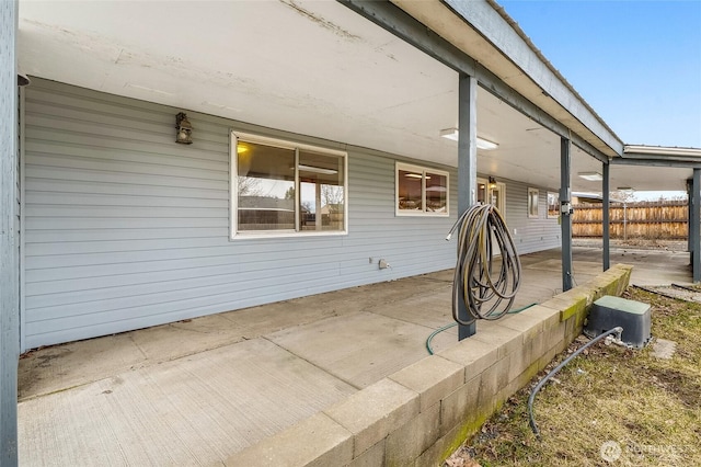 view of patio / terrace featuring fence