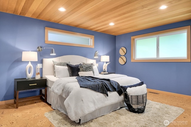 bedroom featuring recessed lighting, baseboards, and wood ceiling