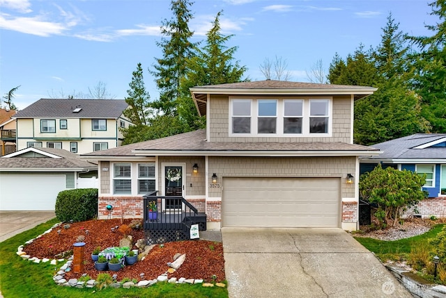 view of front of property with brick siding, concrete driveway, and an attached garage