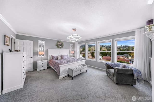 bedroom featuring crown molding, baseboards, carpet floors, and a textured ceiling