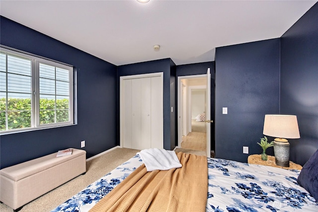 bedroom featuring a closet and carpet flooring