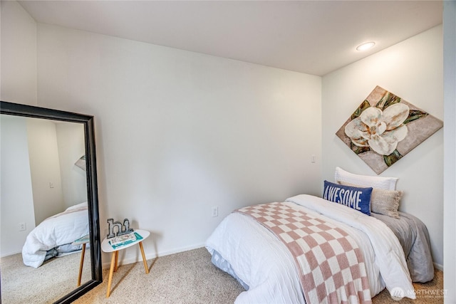 carpeted bedroom with baseboards