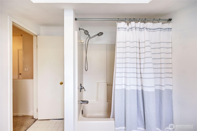 bathroom with tile patterned flooring and shower / tub combo with curtain