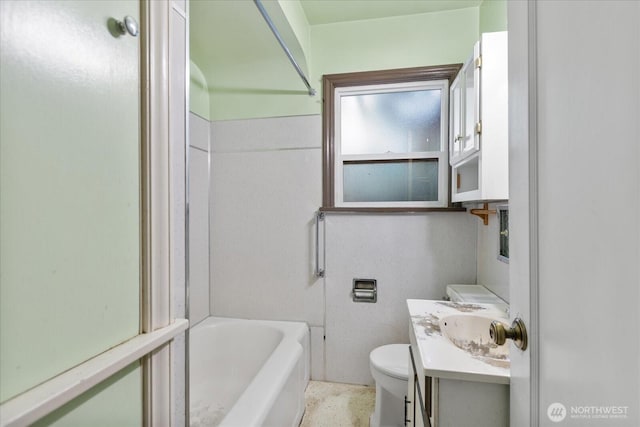 bathroom featuring toilet and vanity