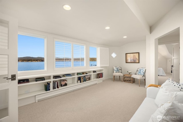 living area with recessed lighting and carpet floors