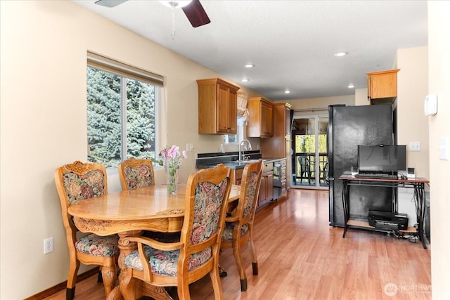 dining area featuring a ceiling fan, light wood-style flooring, and recessed lighting