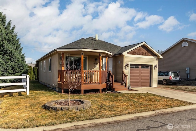 view of front of home featuring fence, concrete driveway, a front yard, a garage, and crawl space