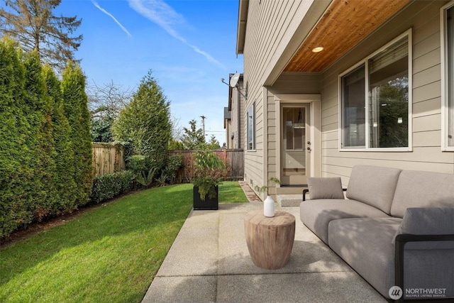 view of patio with outdoor lounge area and a fenced backyard