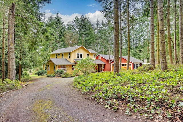 rustic home with dirt driveway