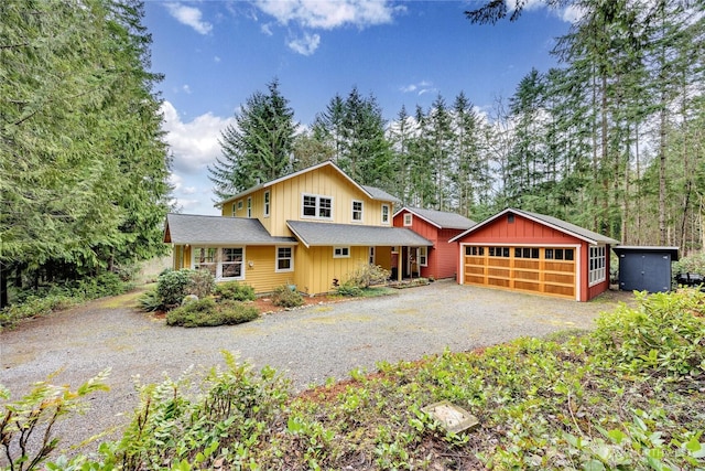 chalet / cabin featuring driveway