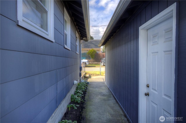 view of side of property with fence