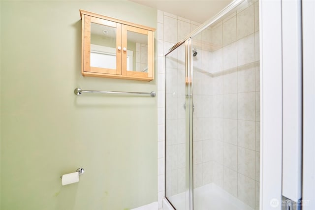 bathroom featuring a stall shower