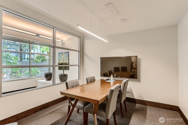 dining space with baseboards