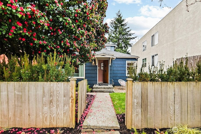 view of front of house with fence