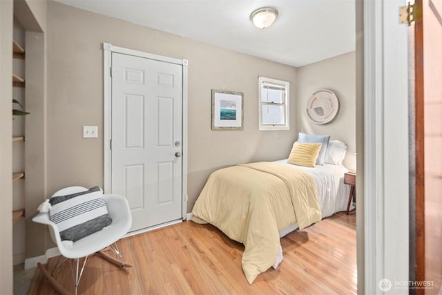 bedroom featuring light wood-style floors