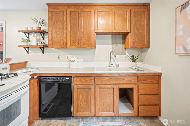 kitchen featuring a sink, white range with gas cooktop, dishwasher, and light countertops