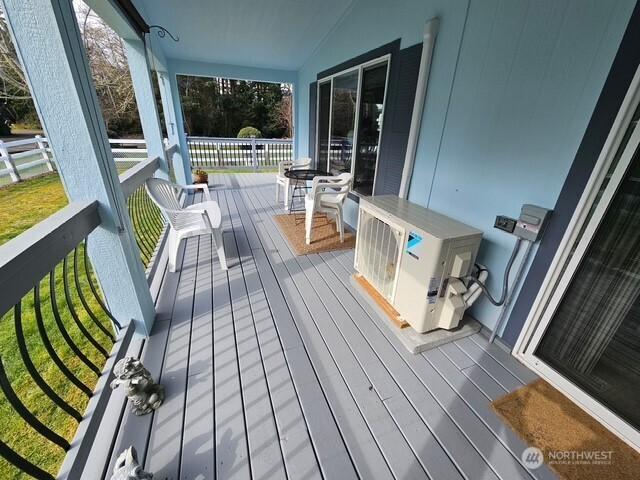 deck featuring ac unit