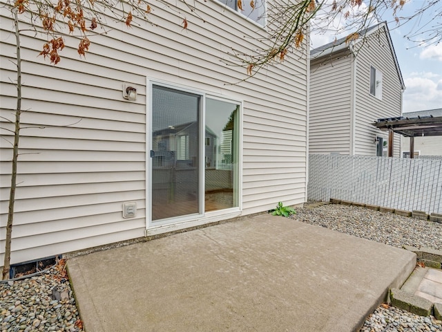 view of patio with fence