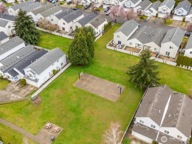 birds eye view of property with a residential view