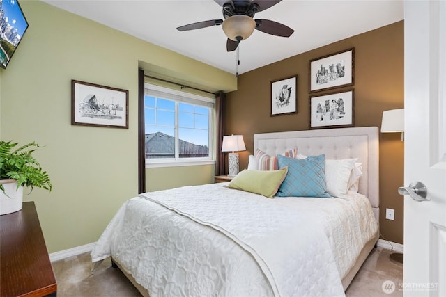 bedroom featuring carpet flooring, baseboards, and ceiling fan