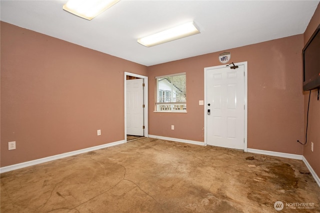 empty room with baseboards