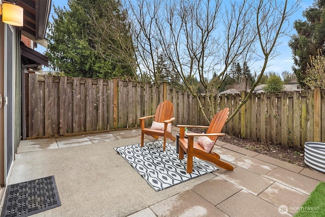 view of patio featuring a fenced backyard