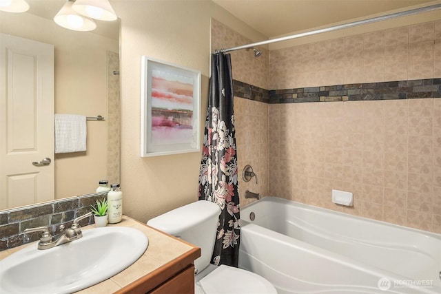 full bathroom featuring vanity, toilet, and shower / tub combo with curtain